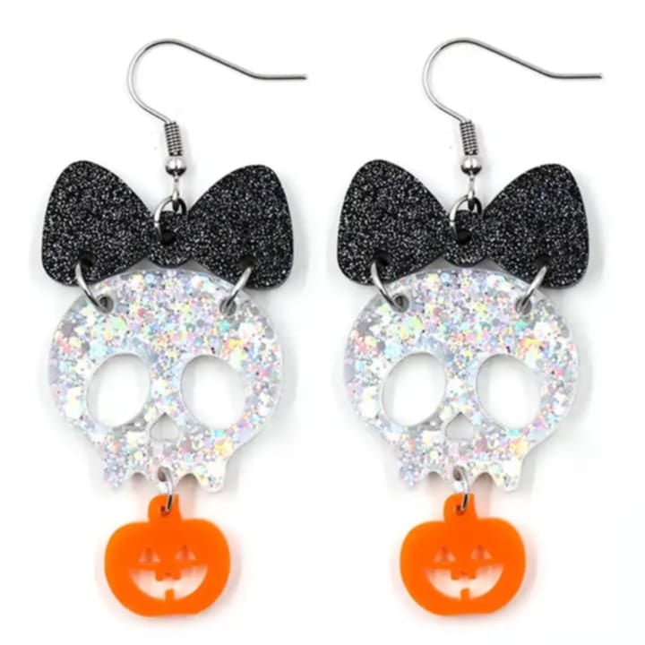 Aretes de calavera con moña y calabaza