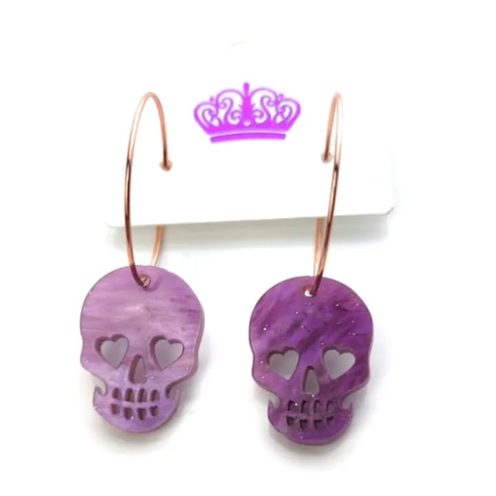 Aretes de calavera lila