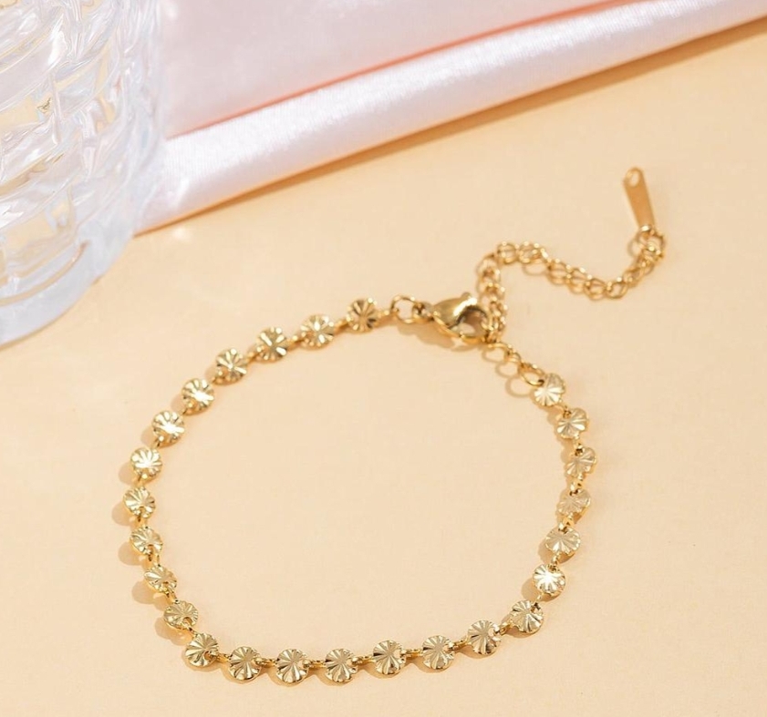 Pulsera de oro dorada