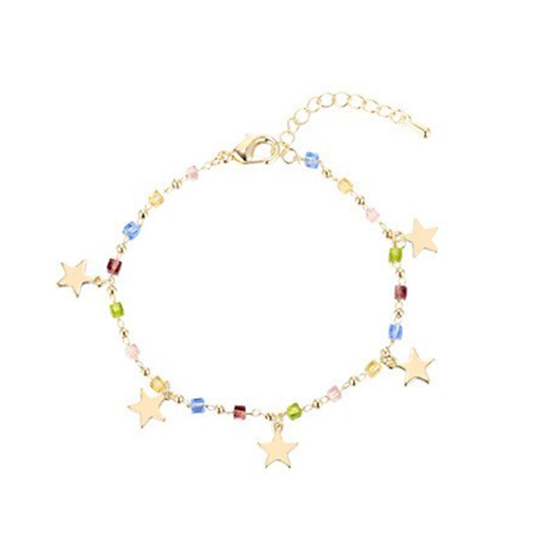 Pulsera de estrellitas doradas