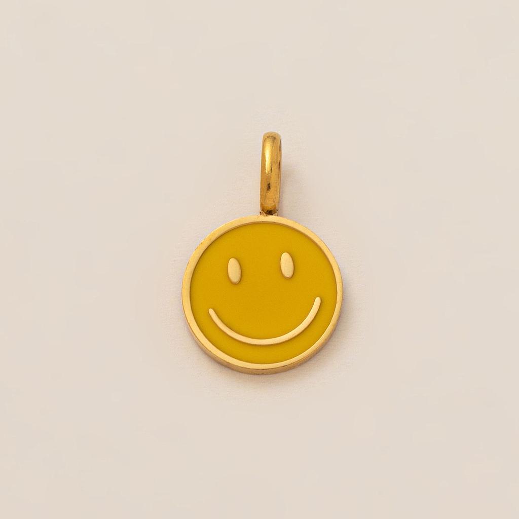 Charm de carita feliz amarilla